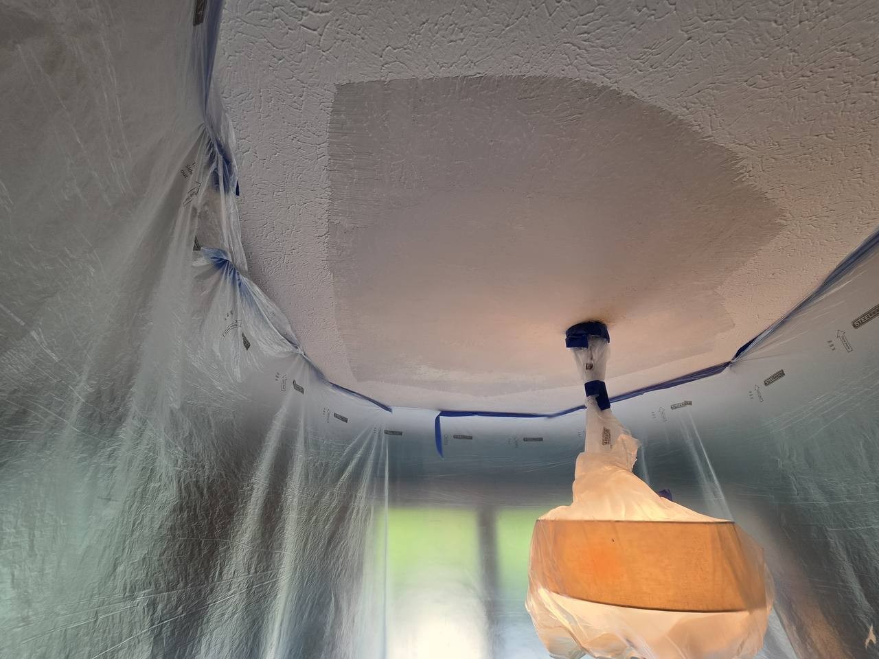 Louisville ceiling texture match with fixture protected and work zone contained